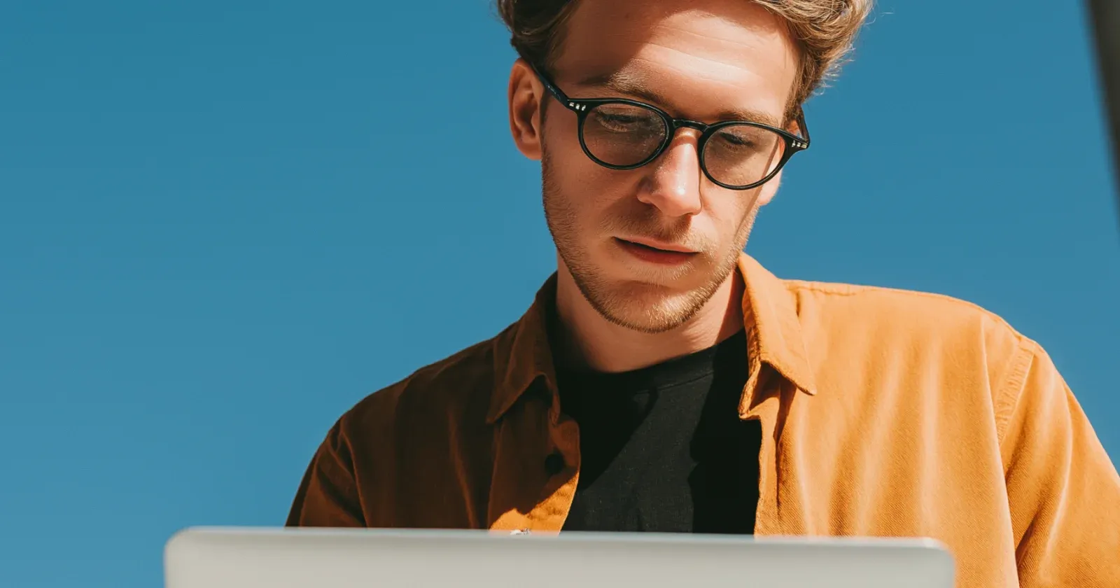Freelancer comparing freelance job platforms on a laptop